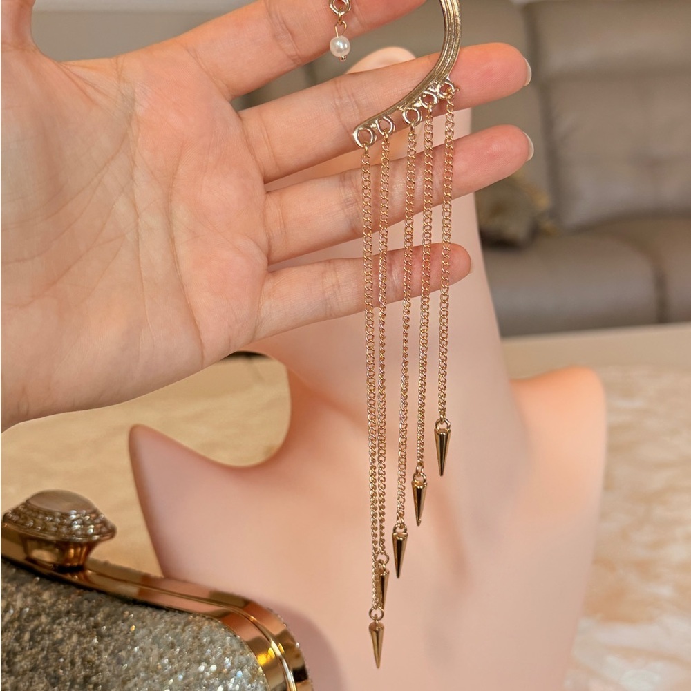 Elegant Gold Tassel Earrings - Picture 5 of 11